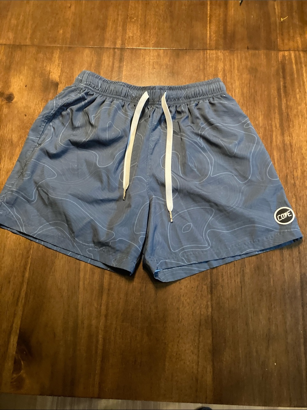 Cove Blue Swim Trunks with White Drawstring